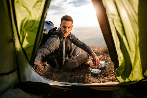 istock Hiking young man and lunch break 1055905600