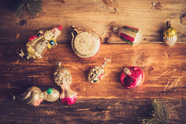 istock Retro Alarm Clock, Vintage Leather Suitcases, Old Fashioned Christmas Tree Decorations, copy space for your text 1055910200