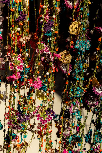 istock Colorful needle work embroidery flowers as a background 1055914566