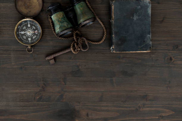 istock Overhead view of desk with sailor's items 1055916344