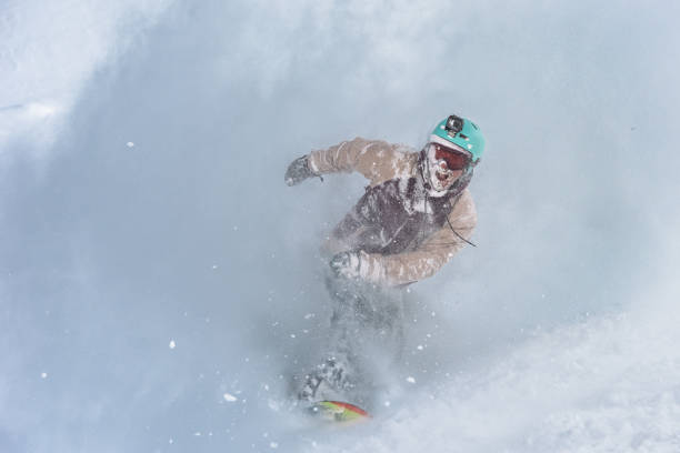 istock Extreme snowboard rider on deep powder snow 1055919582
