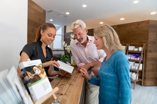 Happy clients talking to the manager at the spa