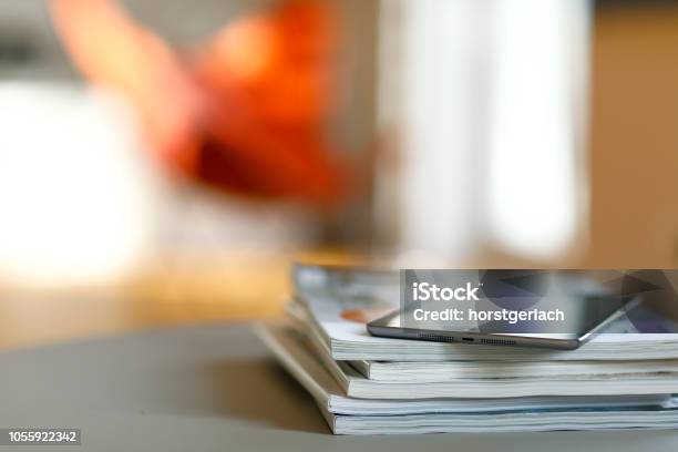 Sunlit Living Room Stock Photo - Download Image Now - Magazine - Publication, Digital Tablet, Reading