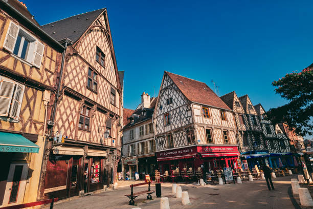 Place Gordaine, Bourges, Auvergne, France Place Gordaine in the city of Bourges, Auvergne Region of France. The timbered trim on the building fascias is common in the old district of the city. auvergne rhône alpes stock pictures, royalty-free photos & images