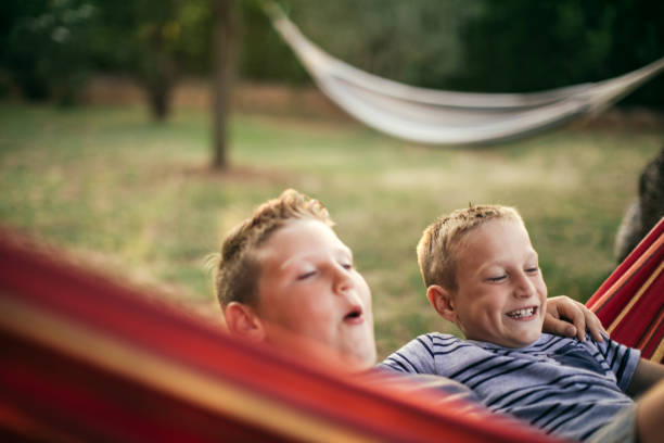 istock Family enjoying hammock 1055930796