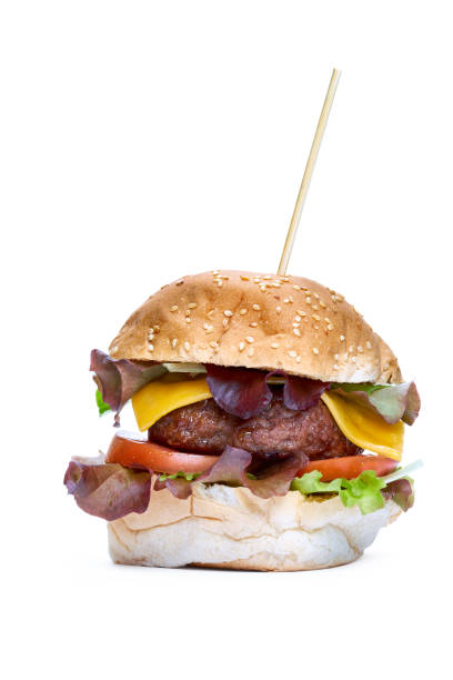 istock A cheese burger with lettuce, tomatoes and sesame bread bun 1055931444