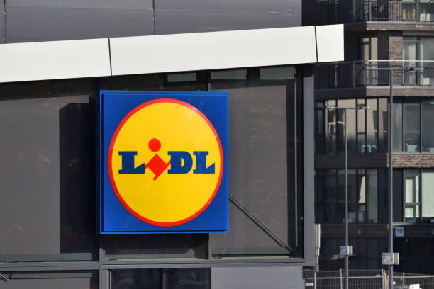 Logo of a Lidl Supermarket Vilnius, Lithuania, October 10: Logo of a Lidl Supermarket on October 10, 2018 in Vilnius, Lithuania. Lidl is a German global discount supermarket chain spread all accross Europe global banner pictures stock pictures, royalty-free photos & images