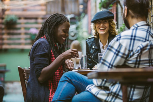 istock Happy Friends On Coffee Break 1055936338