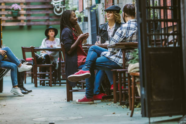 istock Happy Friends On Coffee Break 1055936390