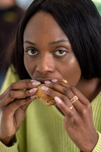 Young black woman at lunch