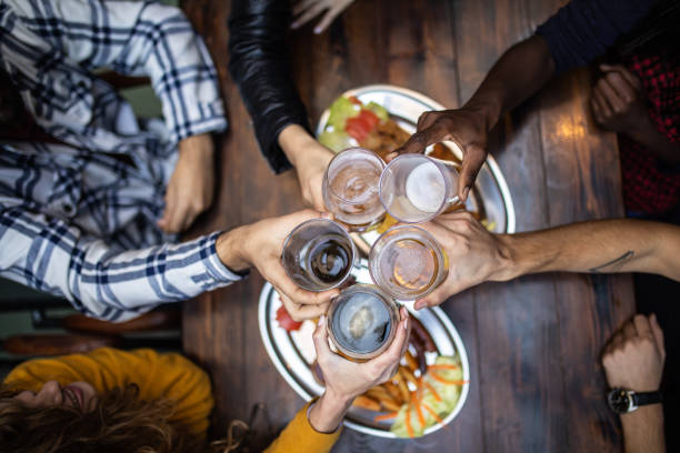 different kinds of beer - beer pub women pint glass imagens e fotografias de stock