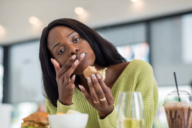 Young black woman at lunch