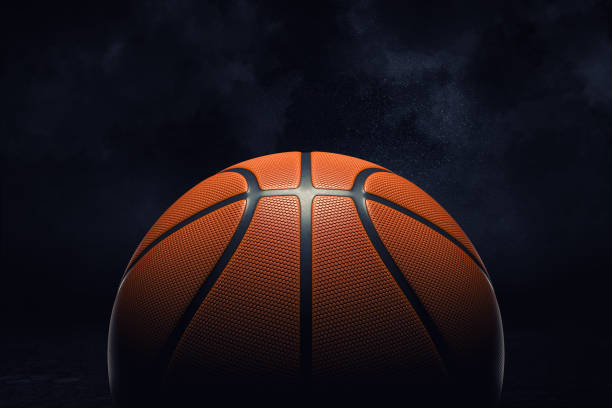 3d-rendering einer orange rubber oberfläche eines basketball-ball auf einem schwarzen hintergrund angezeigt. - isolated leisure games three dimensional three dimensional shape stock-fotos und bilder