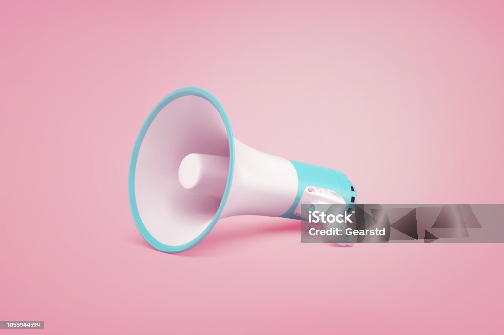 A white and blue portable cordless megaphone lies on a pastel pink background. 3d rendering of white and blue portable cordless megaphone lies on a pastel pink background. Getting your message through. Amplifying your point. Getting attention. Megaphone Stock Photo