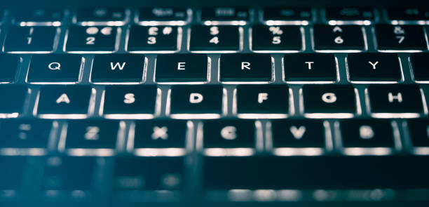 istock Close up, abstract image of a laptop, computer keyboard. 1055950440