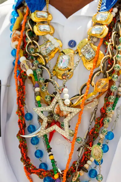 Photo of Neklace used by man during traditional religious celebration in Brazil