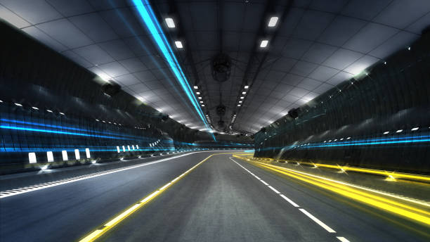 istock empty city highway tunnel with spotlights 1055954024