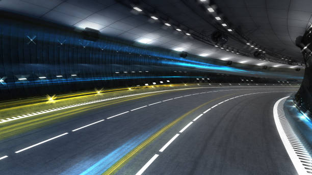 istock empty highway tunnel with spotlights and light fibers 1055954158