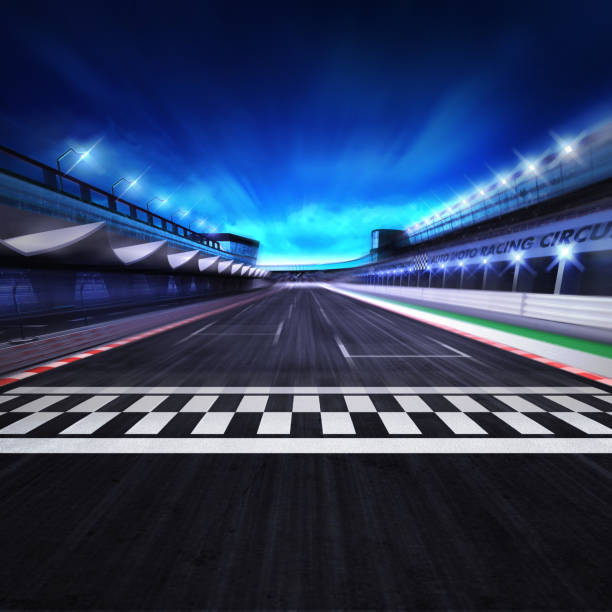 finish line on the racetrack in motion blur with stadium and spotlights - end of round imagens e fotografias de stock