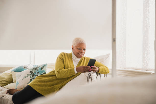 istock Surfing the Web on Her Smartphone 1055958664