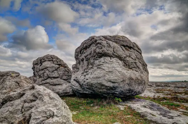 Dragon head. The Burren is a karst-landscape region or alvar in northwest County Clare, in Ireland. Boulders.