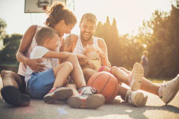 istock Family on playground. 1055962284