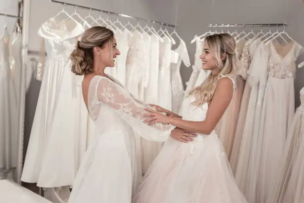 Photo of Happy beautiful brides preparing to the double wedding