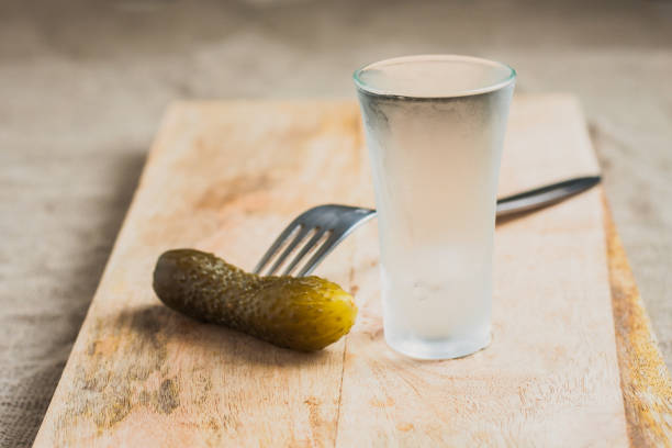 A glass of vodka on the table