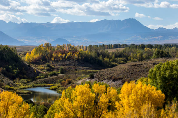 istock landscape mountains autumn pond 1055977714