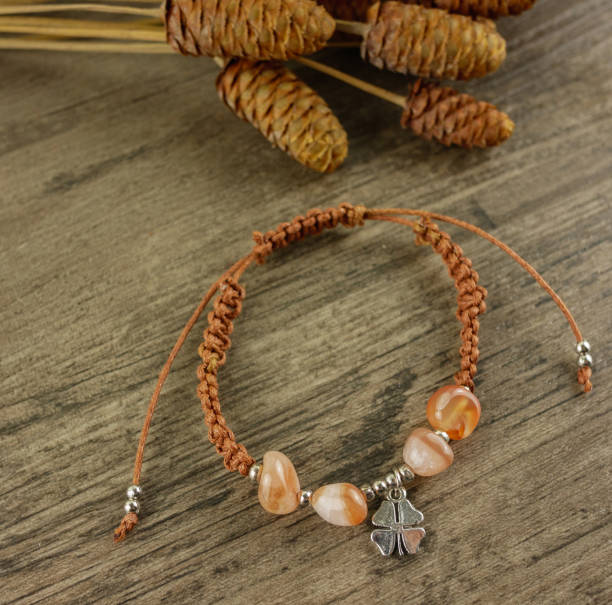 istock Bracelet on wooden background 1055980716