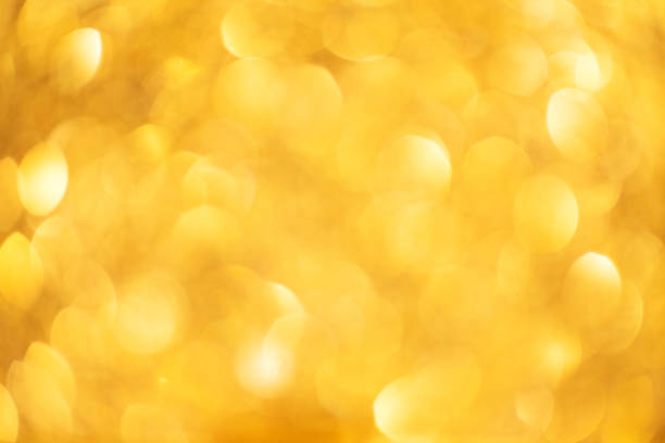 istock Gold glitter texture. Vector background with golden metallic effects. 1055985356