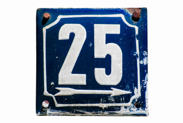 istock Weathered enameled plate number 25 1056005220