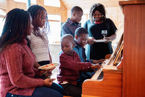 istock Thanksgiving dinner with American-African family preparing dinner 1056008142