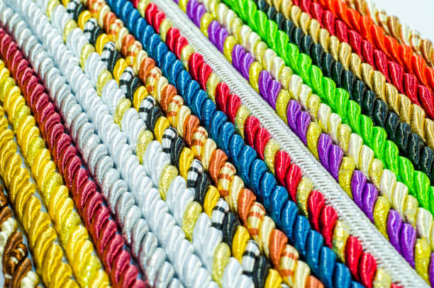 istock Multicolored ropes laid nearby, colored background, textiles 1056011908