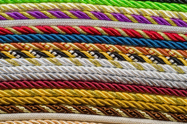 istock Multicolored ropes laid nearby, colored background, textiles 1056012006
