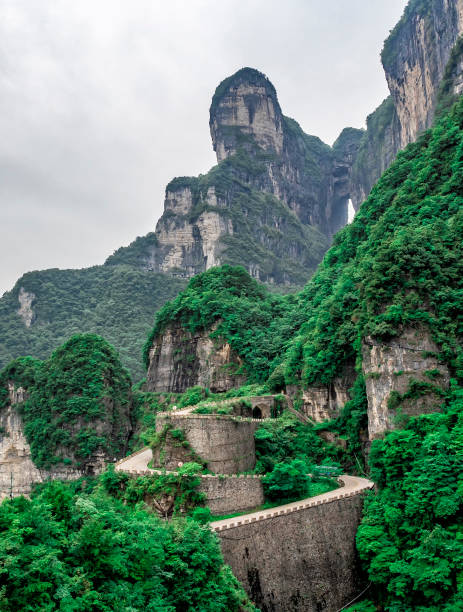 A view of the dangerous  99 curves at the Tongtian Road to Tianmen Mountain, The Heaven's Gate at Zhangjiagie, Hunan Province, China, Asia stock photo