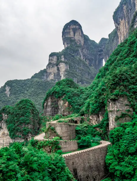 Photo of A view of the dangerous  99 curves at the Tongtian Road to Tianmen Mountain, The Heaven's Gate at Zhangjiagie, Hunan Province, China, Asia