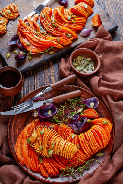 istock sliced roasted halves of Butternut pumpkin 1056014866