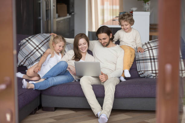 istock Whole family spending time together at home 1056019172