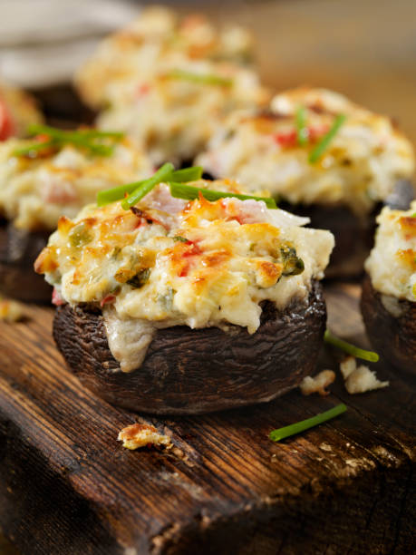 istock Creamy, Crab and Shrimp Stuffed Mini Portobello Mushroom Caps 1056022708