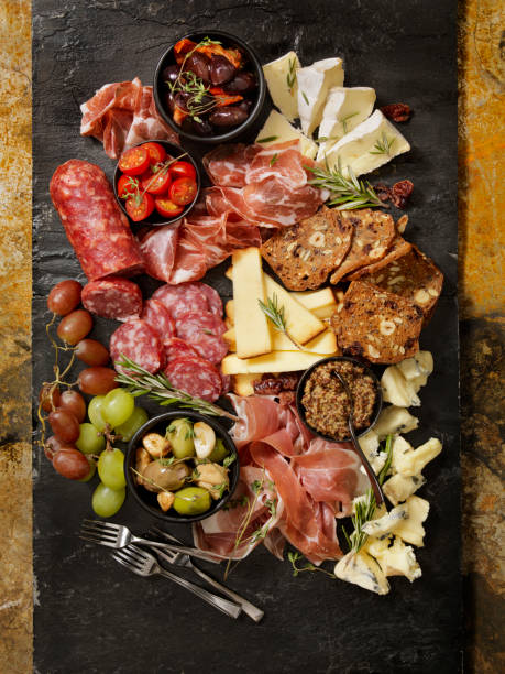 Charcuterie Board Charcuterie Board appetizer plate stock pictures, royalty-free photos & images