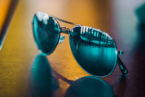 istock Sunglasses in a coffee shop in a downtown area. 1056024136