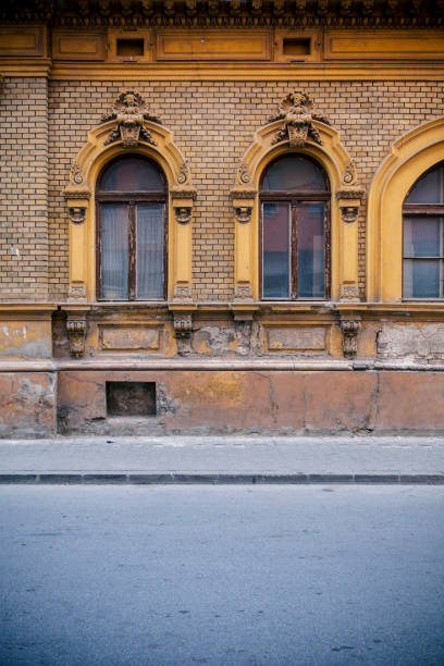 istock old building with a facade of yellow brick 1056033350