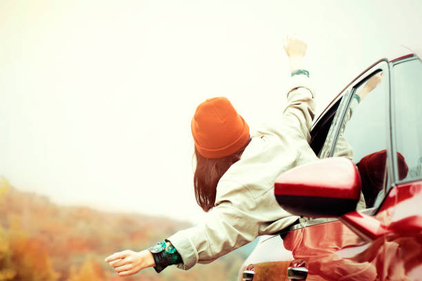 istock free woman traveling 1056035624