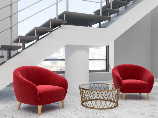 istock Red armchairs in white loft office waiting area 1056035954