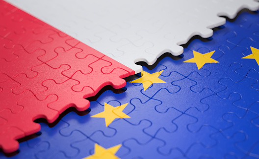 Flag of the Poland and the European Union in the form of puzzle pieces in concept of politics and economic union.