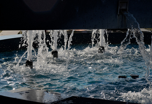 Close-up shot of the faucet in the street fountain