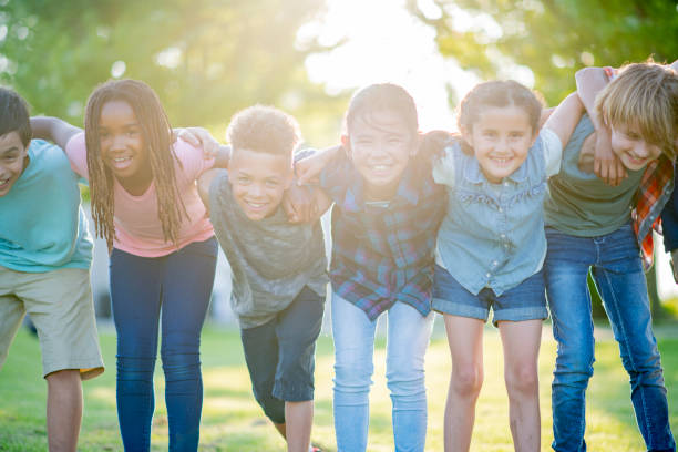 istock Kids smiling in the summer sun 1056054830