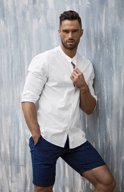 istock Handsome man wear white shirt and shorts 1056058036
