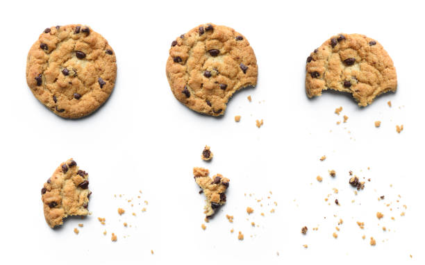 Steps of chocolate chip cookie being devoured. Isolated on white background. Steps of chocolate chip cookie being devoured. Isolated on white background. chocolate cookies stock pictures, royalty-free photos & images